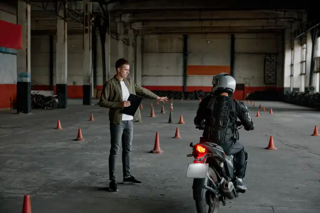 Instructor teaching a rider during motorcycle lessons