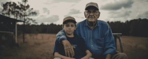 Elderly man and grandson
