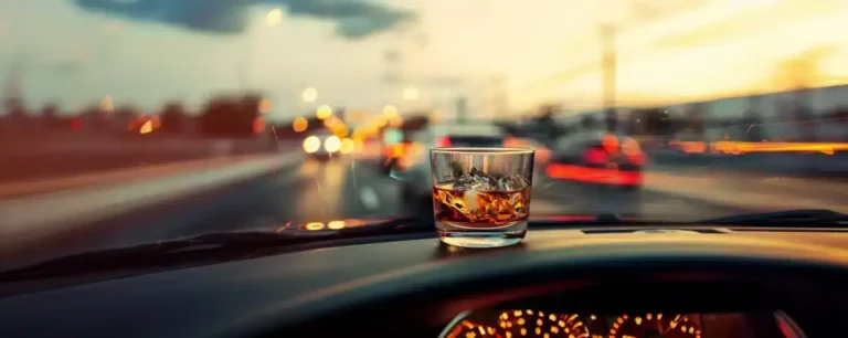 A whisky glass placed on the steering in a speeding car