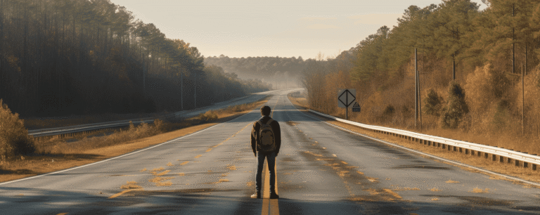 Man standing on highway