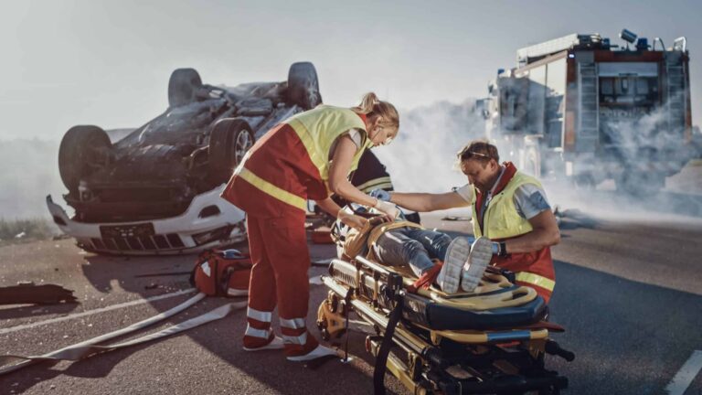 At the scene of the truck accident: Paramedics are savinga life