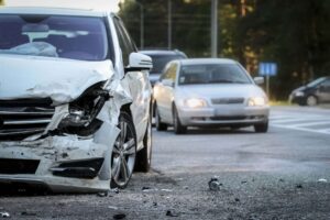 Front of a car is damaged by traffic accident