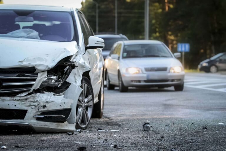 Front of a car is damaged by traffic accident