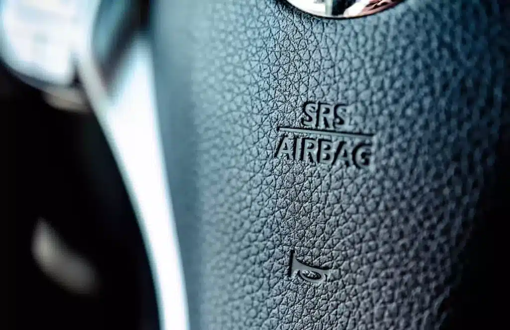 Closeup of steering wheel showing SRS Airbag