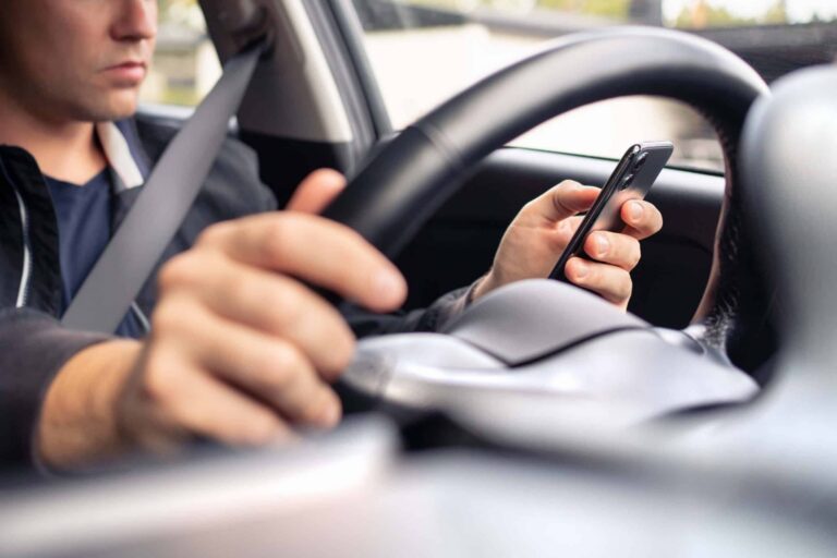 Texting and driving. Using a cell phone in traffic