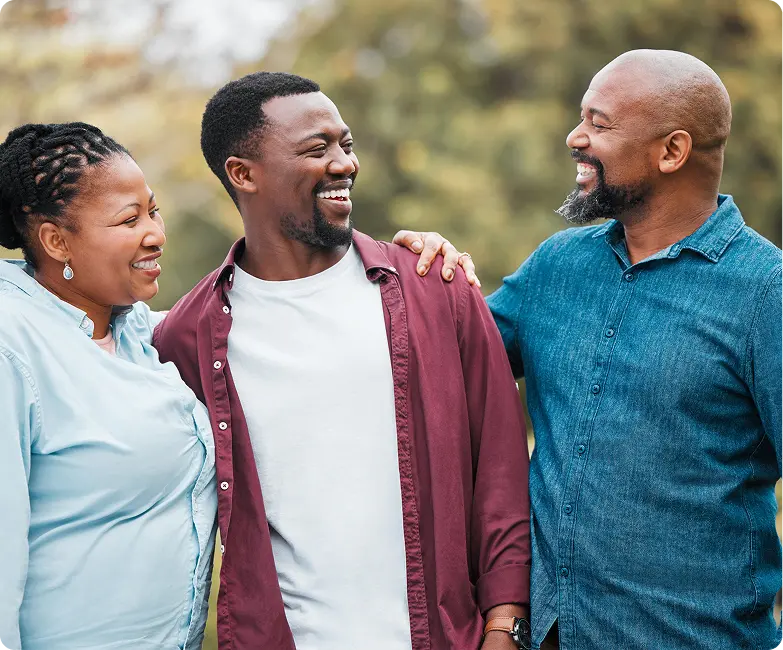Family smiling and hugging